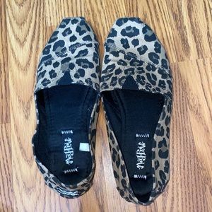 Cheetah print slip on shoes